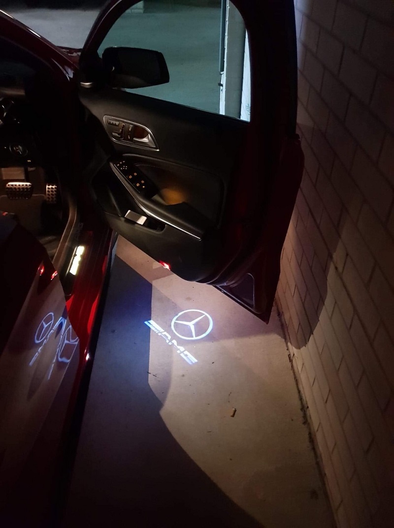 Mercedes LED HD Projektoren / Einstiegsbeleuchtung / Pfützenlicht AMG ML GL  W164 X164 R W251 - Exclusiv veredelte Embleme aus der SCHWEIZ